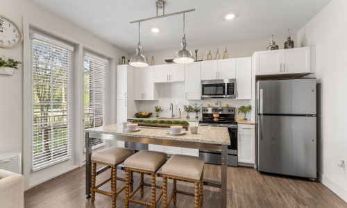 kitchen with white cabinets and stainless steel appliances