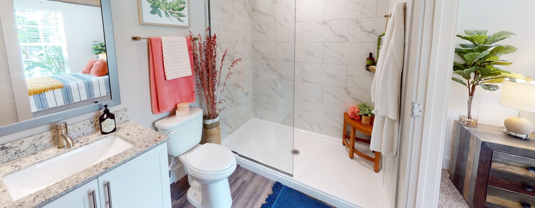 a bathroom with a tub, toilet and sink
