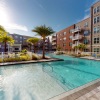 pool with spacious areas and lush landscaping