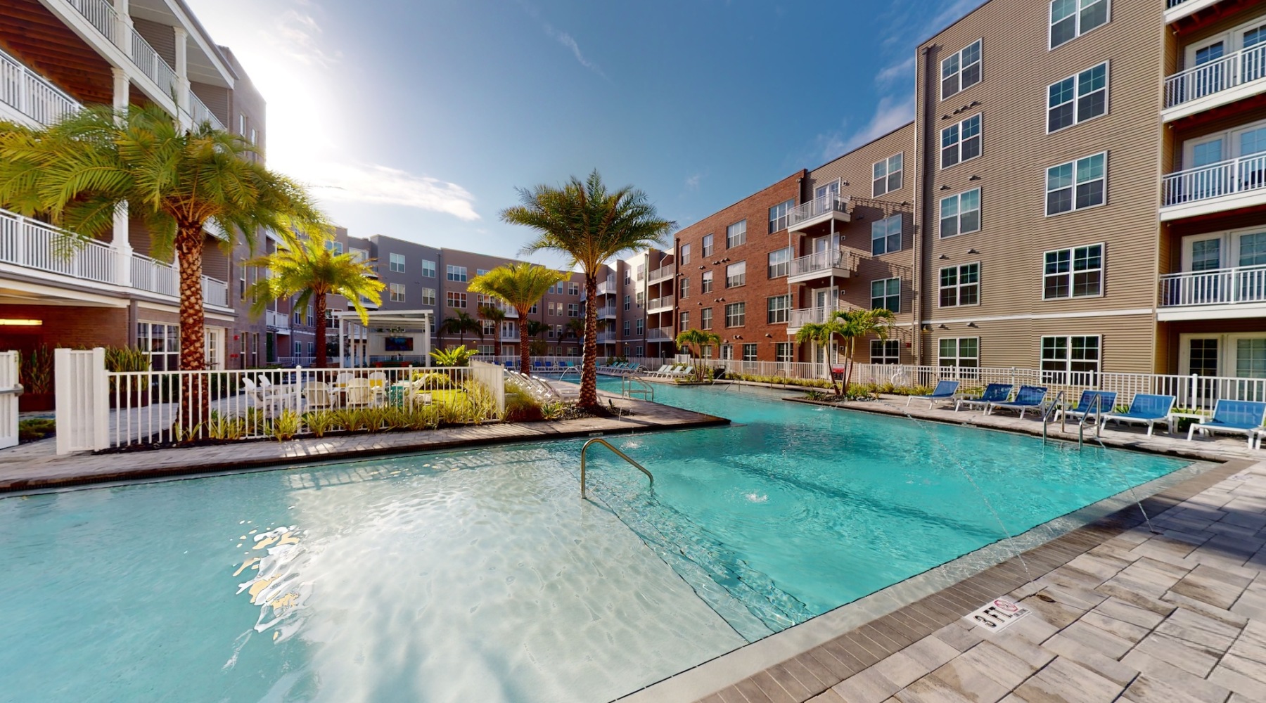 pool with spacious areas and lush landscaping