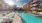 a pool in a courtyard between buildings